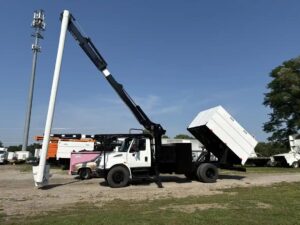 This is a 2013 International 4300 forestry bucket truck with an Altec LR760 (LRV56) Boom and an automatic transmission.